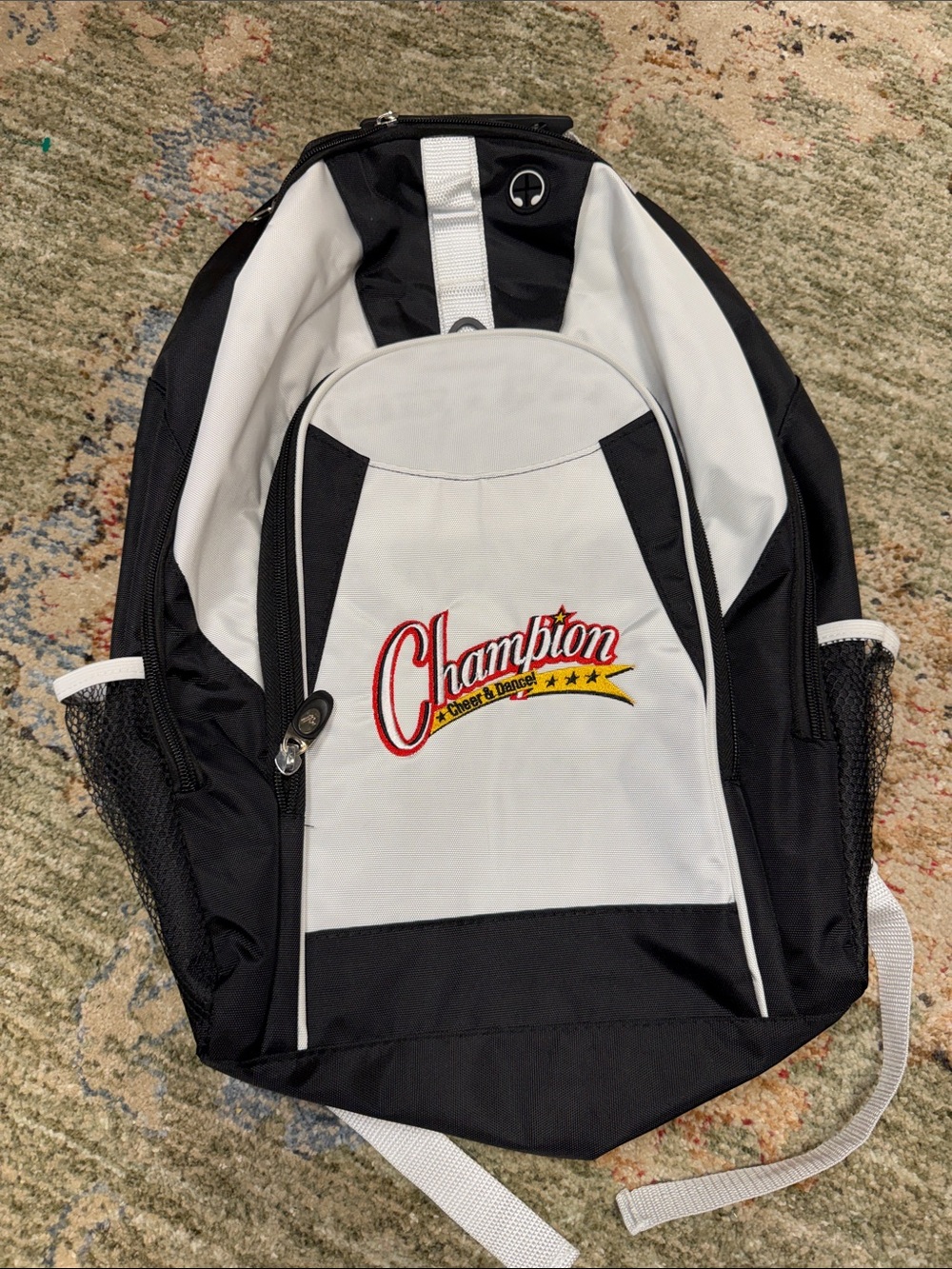 Varsity Black and White Backpack with Red Logo Detail